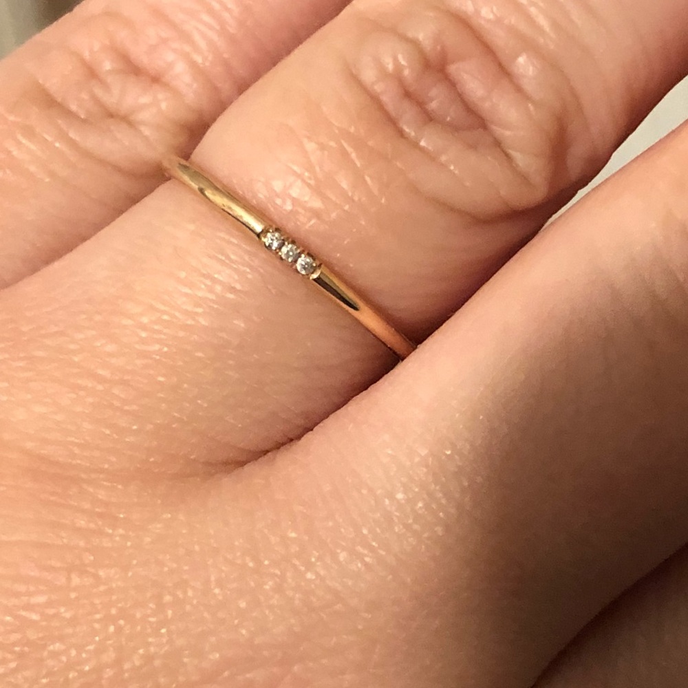 10k rose gold band with three diamonds